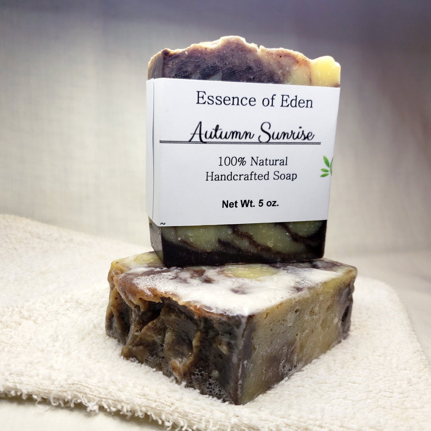 Autumn Sunrise Handcrafted Natural Soap, Cinnamon, Orange, Clove Essential Oils, Olive Oil, Coconut Oil, Tallow, Citric Acid, Cane Sugar, Sea Salt, Lye.